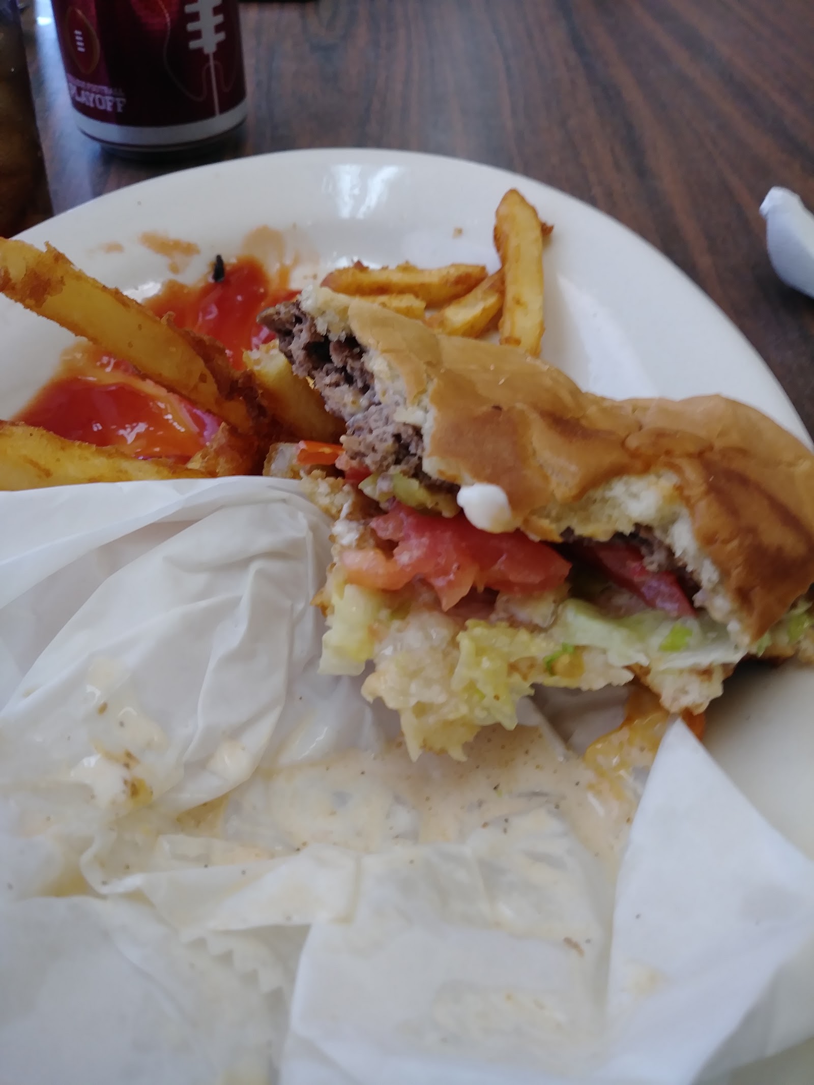 Burger plate with fries at Mauri's Mexican Restaurant